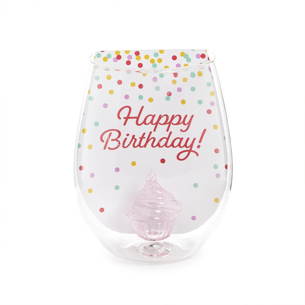 The Celebration Cake Stemless Wine Glass features a clear design with multicolored polka dots and "Happy Birthday!" in red script. A pink, cake-shaped decoration at the bottom adds charm to this 20 oz. capacity wine glass.