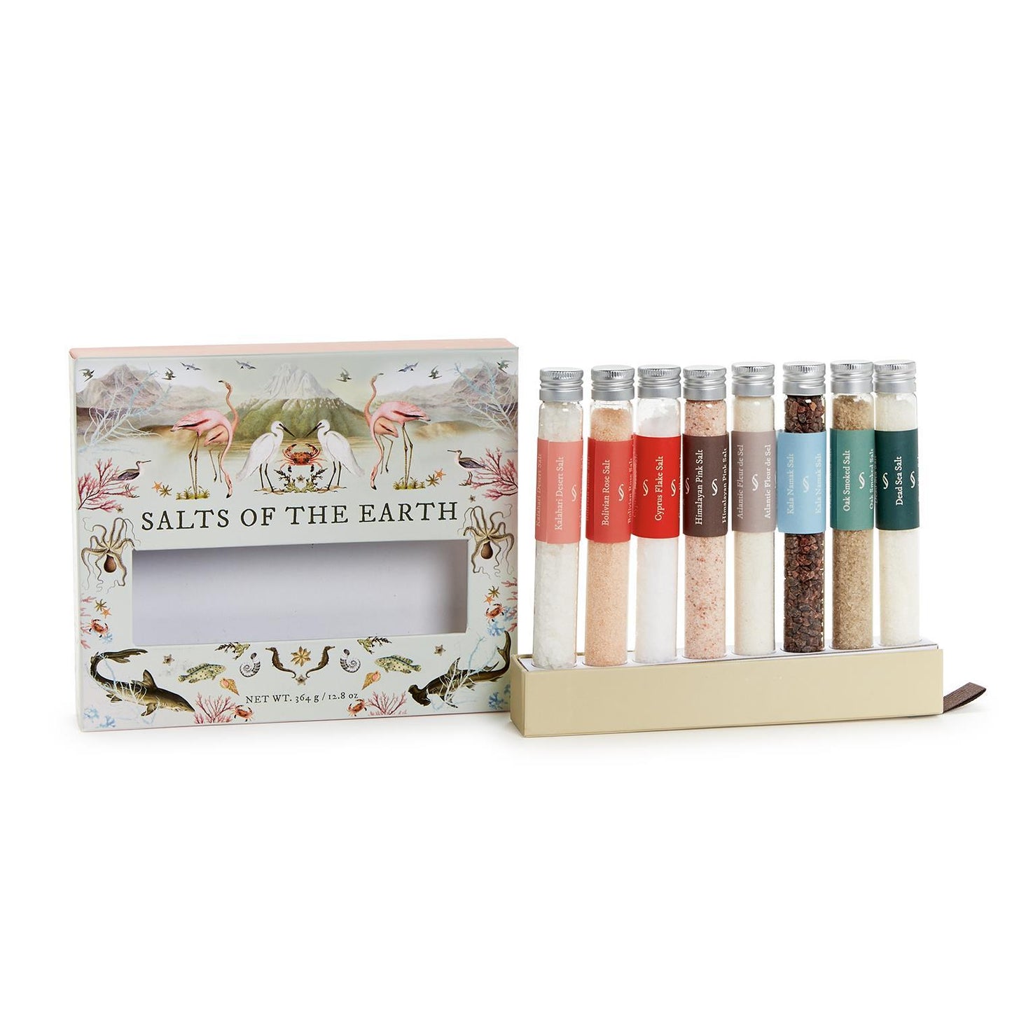 Salts of the Earth" gift set includes eight varieties of culinary salts in glass tubes, attractively displayed in a decorative stand and box with colorful animal and plant illustrations.