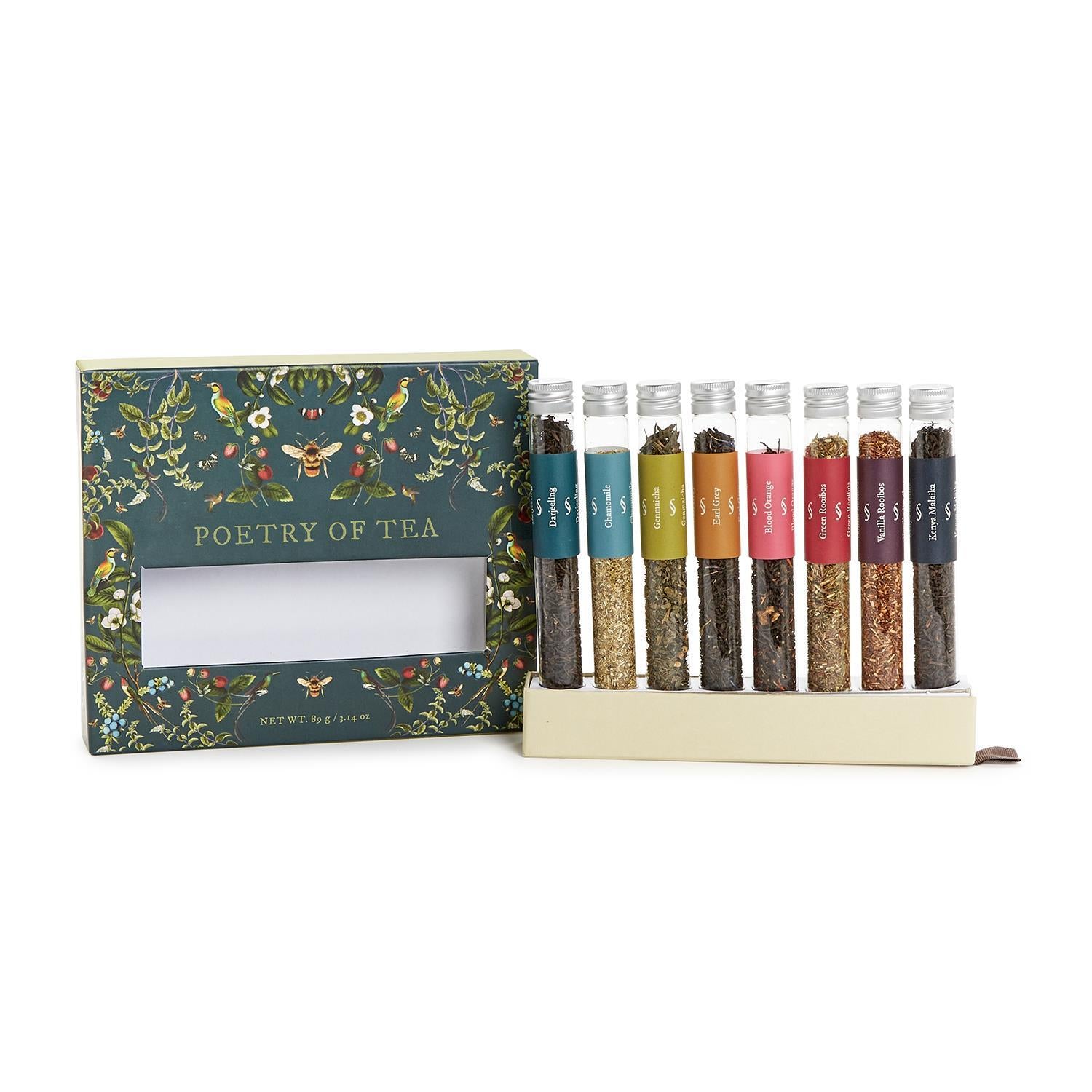 The Poetry of Tea 8 Tube Gift Set includes a collection of diverse teas in clear glass tubes with labeled black caps. The gift box is adorned with floral designs and features a cut-out section to display the contents. Available in one size.