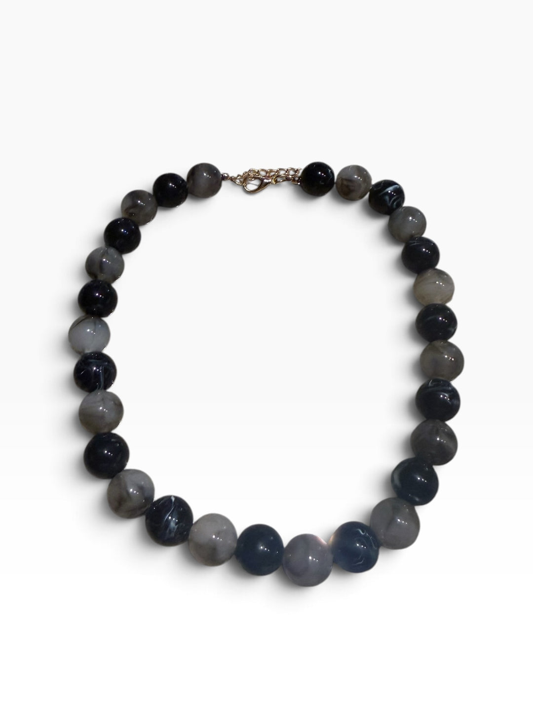 Mixed Color Beaded Necklace with round, marbled grey and black beads and gold-tone clasp. Available in various sizes.