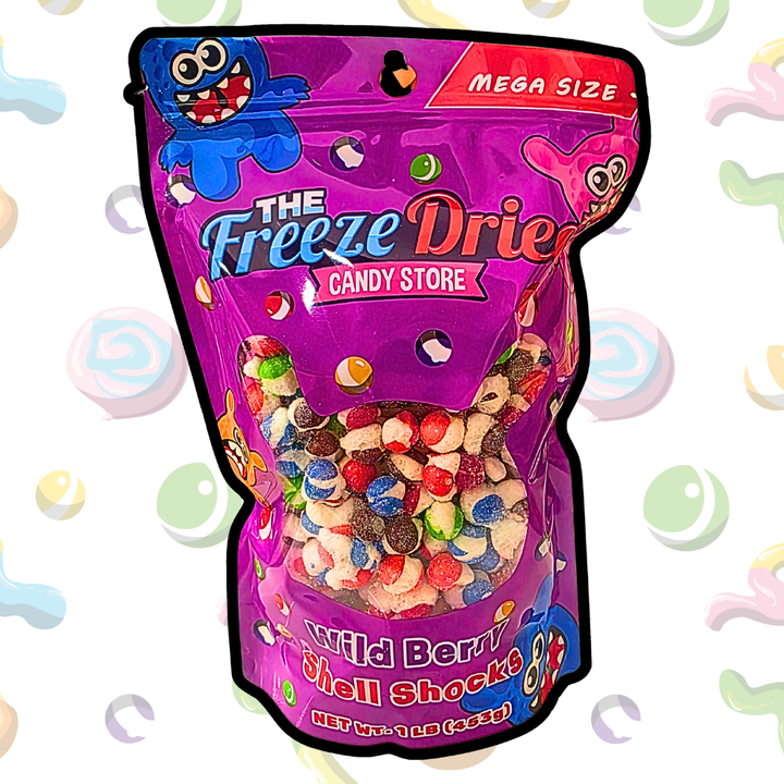 Vibrant purple 4 oz bag labeled "Freeze Dried Shell Shocks: Sour Wild Berry" with colorful crunchy candy inside.