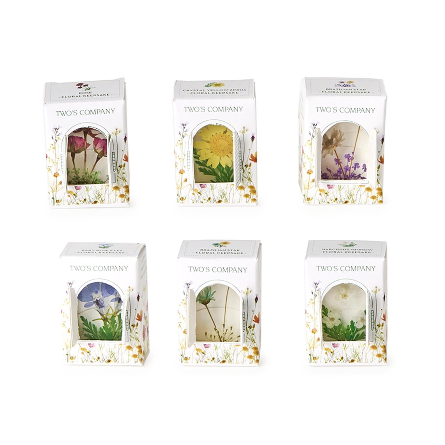 Six Wildflower soap bars, each 3.5 oz, in white boxes with real pressed flowers visible through a clear window; gift box included.