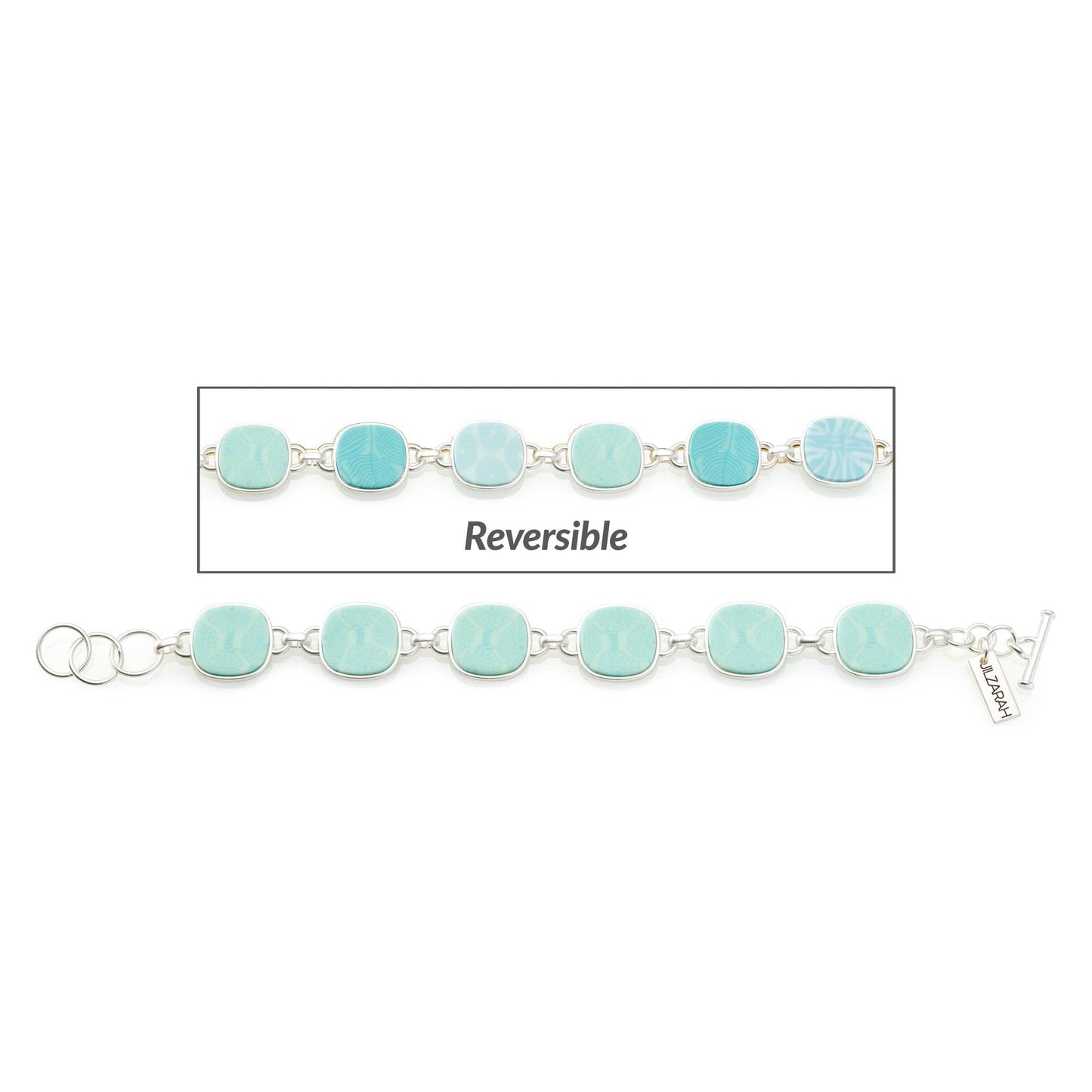 The Palm Beach Reversible Coin Bracelet features light blue, square-shaped links with ocean wave and starfish motifs. Matte gold plating, silver chain connection, clasps at both ends. Available sizes: 6.5", 7", 7.5".