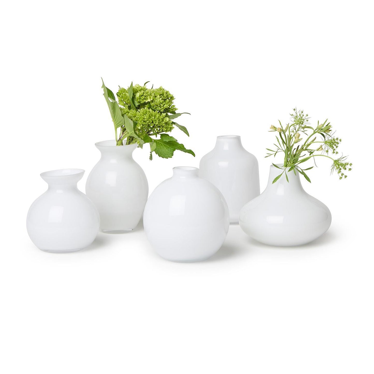Set of five milk white glass vases in assorted shapes and sizes. Available in small, medium, and large.