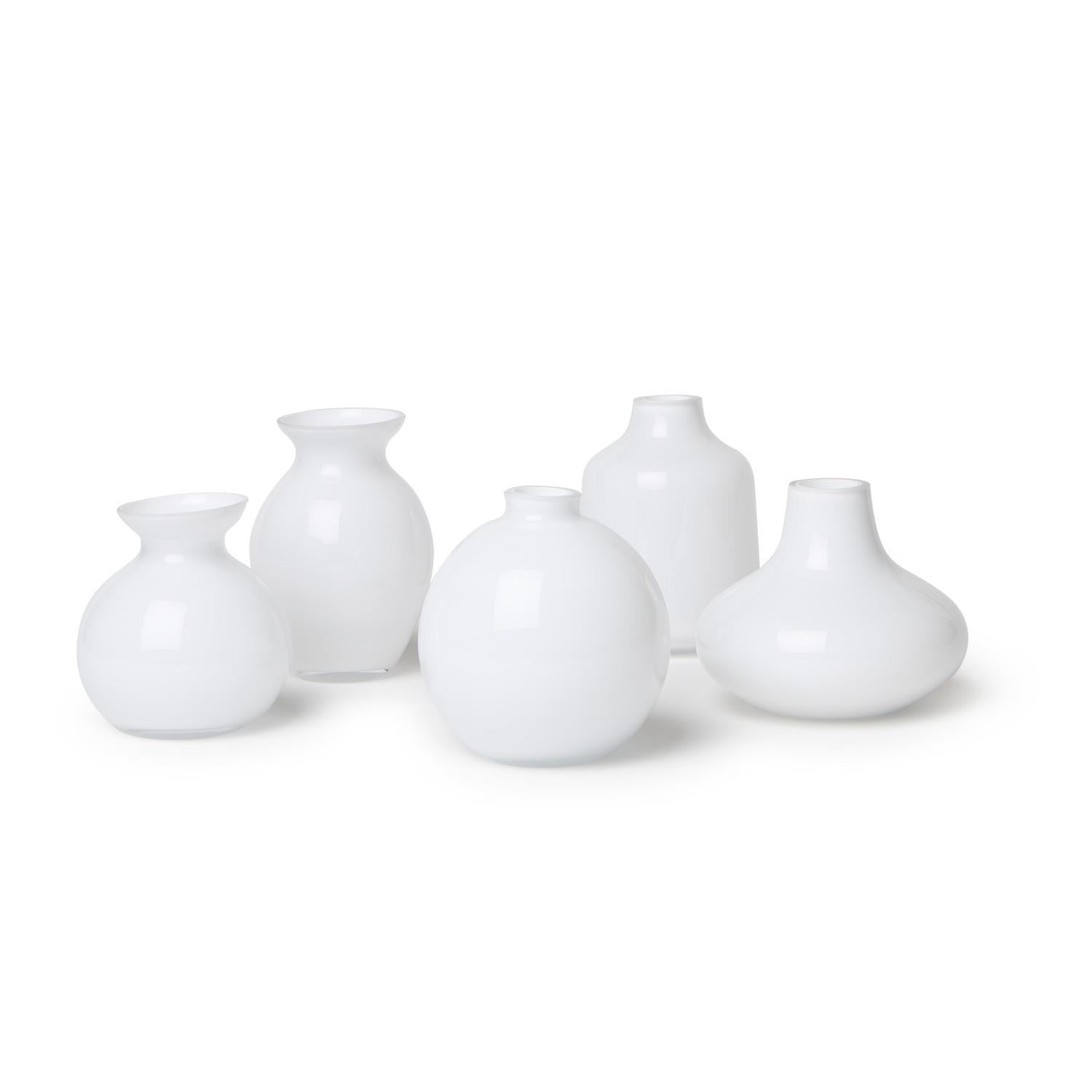 Five handcrafted Milk White Glass Vases, available in assorted shapes and sizes.