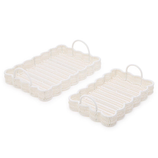 Set of two white all-weather wicker scalloped edge serving trays with handles; available in large and small sizes.