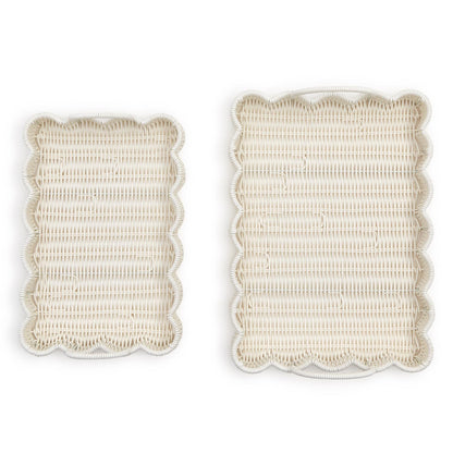 Two all-weather wicker scalloped edge serving trays with handles, light natural finish, available in small and large sizes.