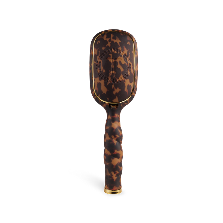 The Boar Bristle Hair Brush | Tortoise has a brown tortoiseshell pattern, gold accents, ergonomic handle; available in two sizes.