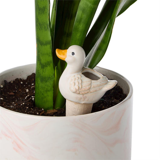 White ceramic duck-shaped self-watering plant spike in gift box; available sizes: small, medium, large.