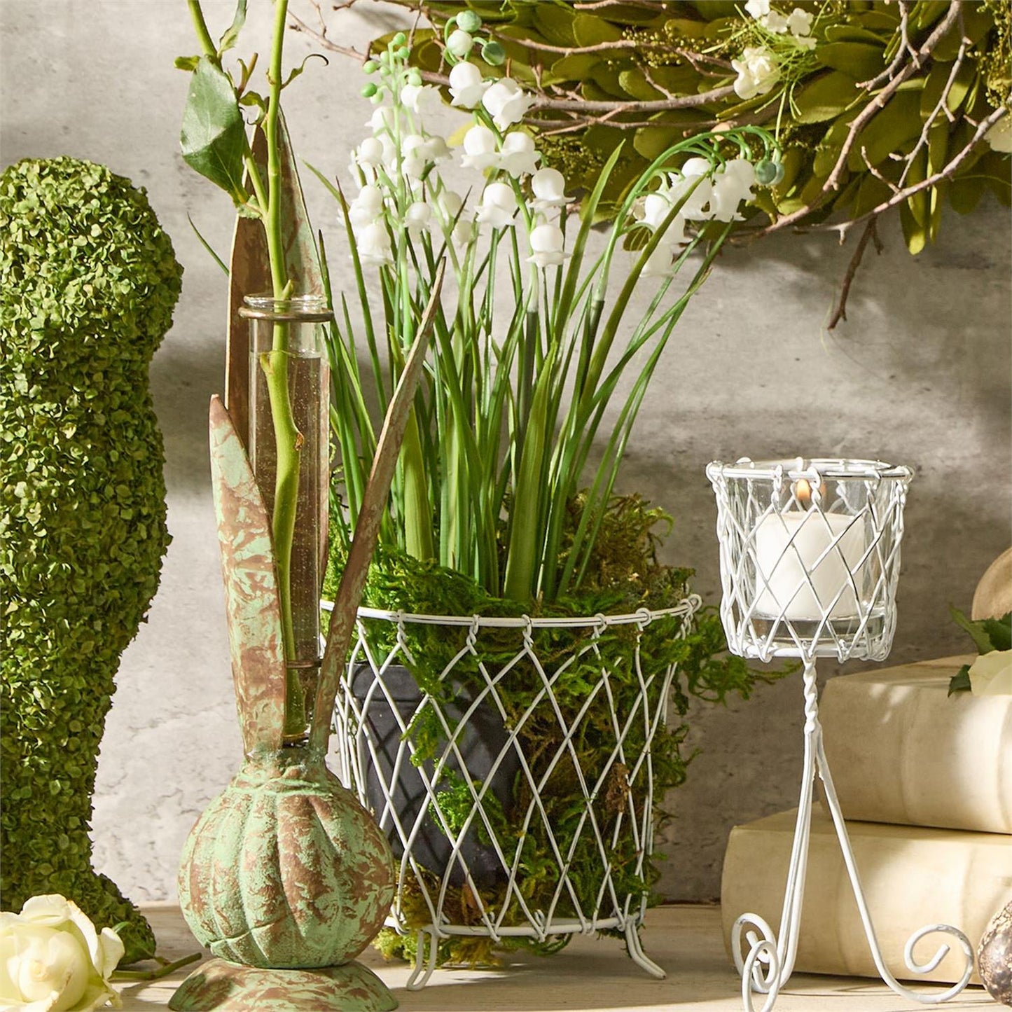 Spring Bulb Faux Potted Lily of the Valley in wire basket; available in small, medium, and large sizes.