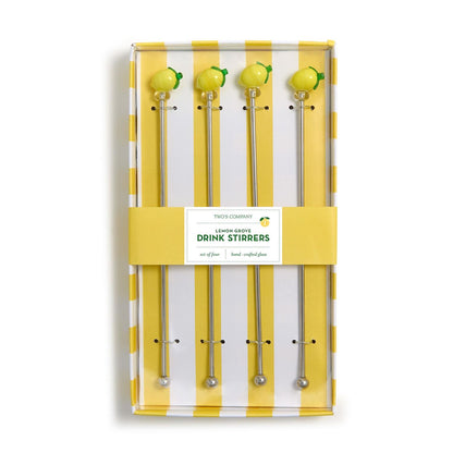 Set of 4 metal stirrers with glass lemon toppers, packaged in a yellow and white striped gift box. Each stirrer is 6" long.
