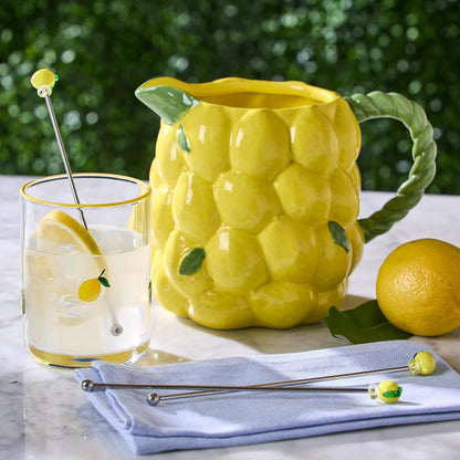 Yellow ceramic lemon-shaped pitcher; sizes available: small, medium, large.