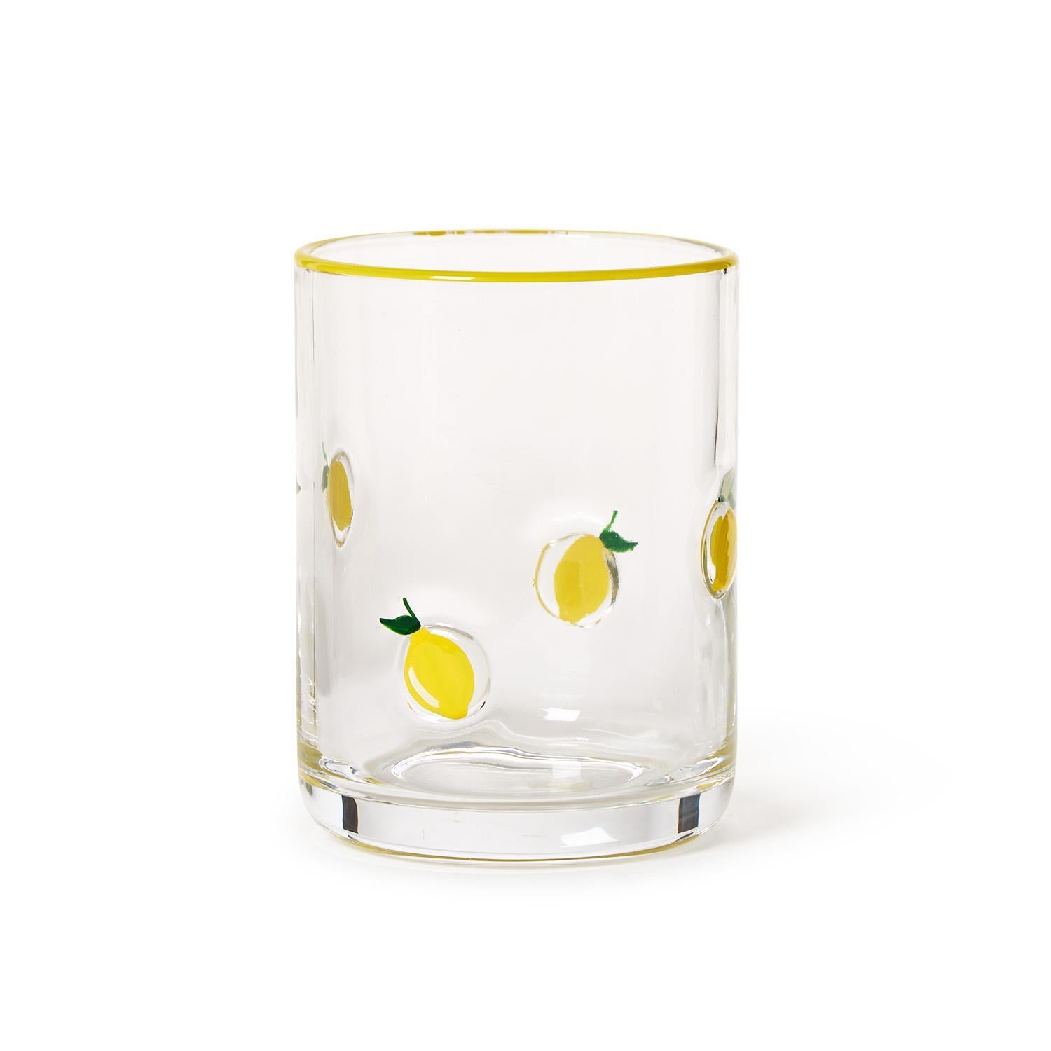 Hand-painted glass with small yellow lemon illustrations and a thin yellow rim. Available in double old fashion size.