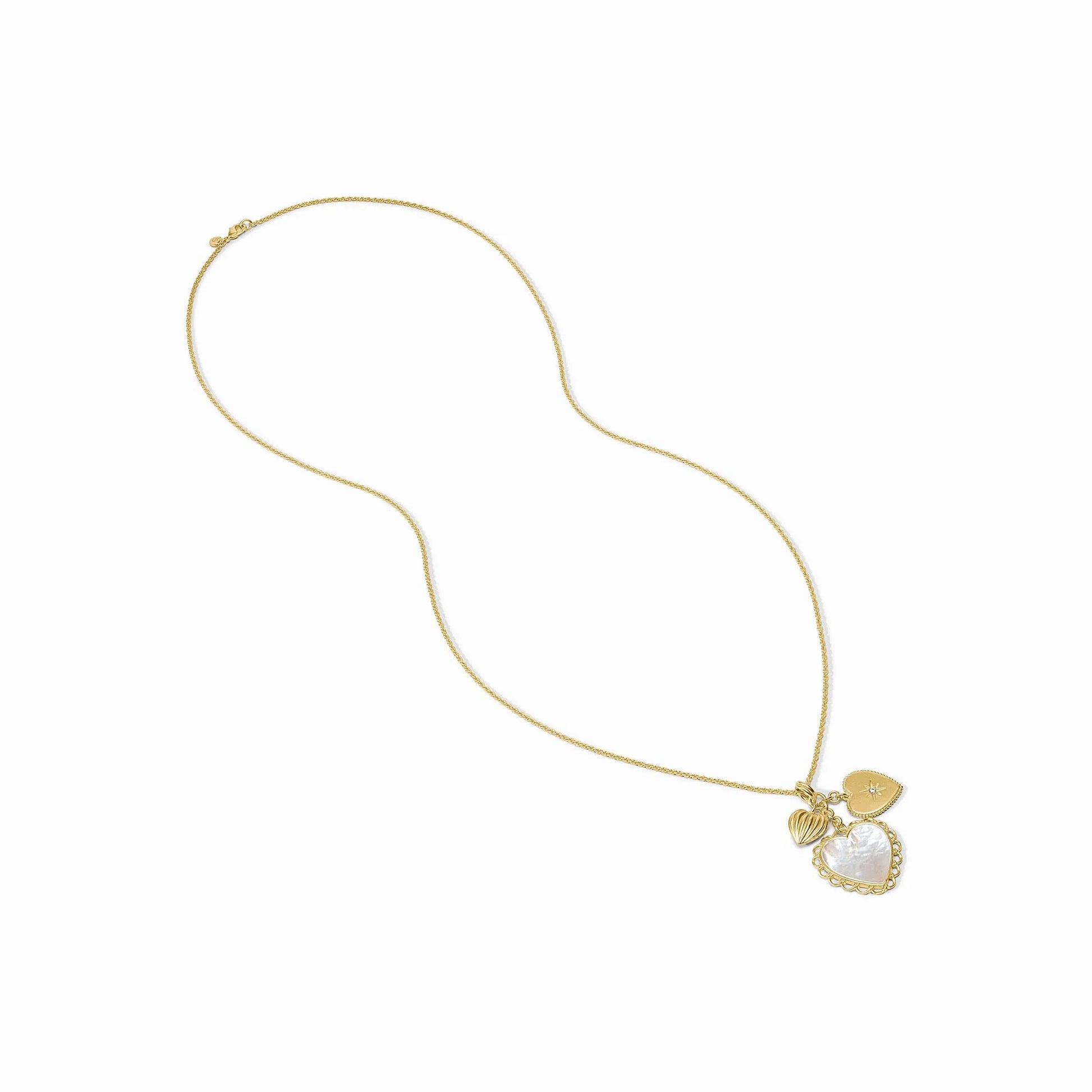 Gold chain necklace with textured gold heart, round disc, and heart-shaped mother of pearl charms. Available in 16", 18".