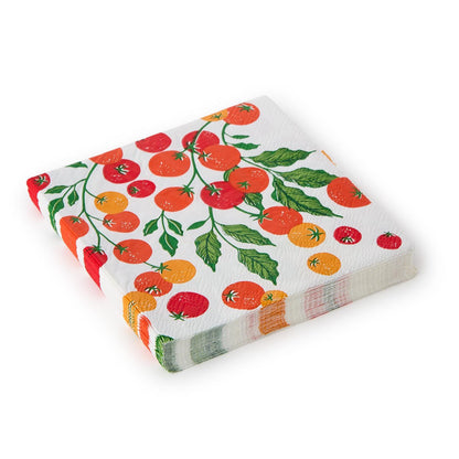 Garden Harvest 3-ply napkin with red and orange tomato print, green leaves. Available in cocktail and dinner sizes.