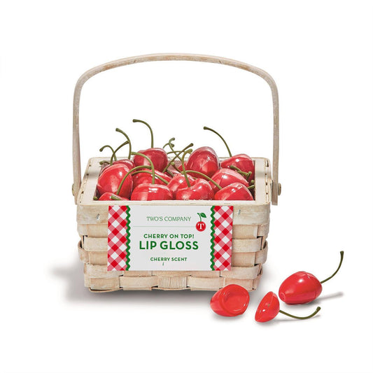 Cherry Lip Gloss in cherry-shaped containers inside a small woven basket; available in standard size.