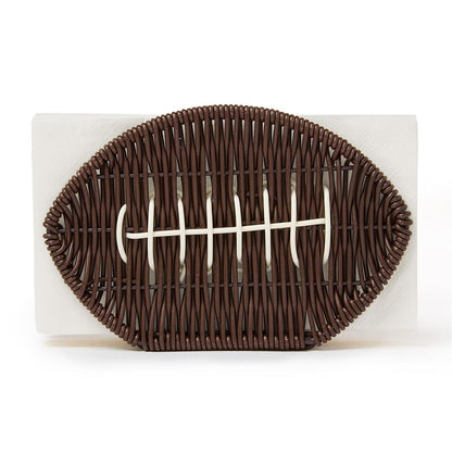 Brown wicker napkin holder shaped like a football with white woven laces at the center; holds standard-size napkins. Sizes available: not specified.