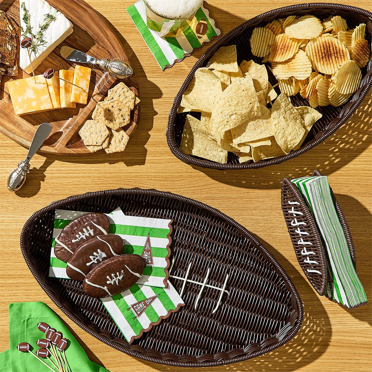 Game Day Football Napkin Holder with neatly arranged football-themed napkins; available in standard size.