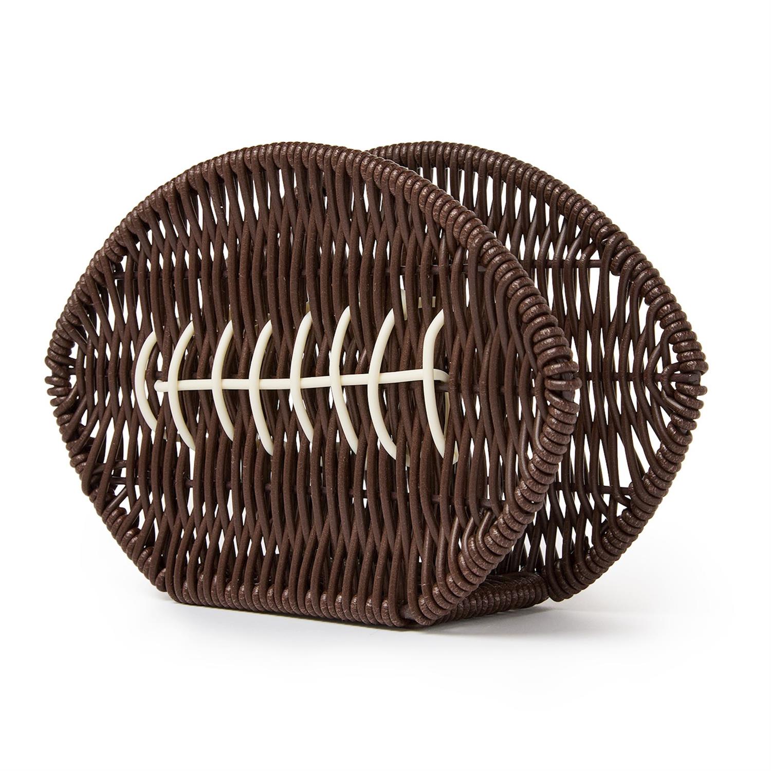 The Game Day Football Napkin Holder is a brown woven basket shaped like a football with white lace-like accents on the front, available in multiple sizes.