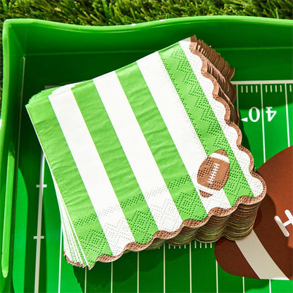 Game Day 3-Ply Scalloped Edge Paper Napkins with green and white stripes and a football design, available in multiple sizes.