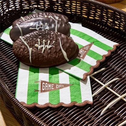 Chocolate football-shaped treats on sticks, available in small, medium, and large sizes.