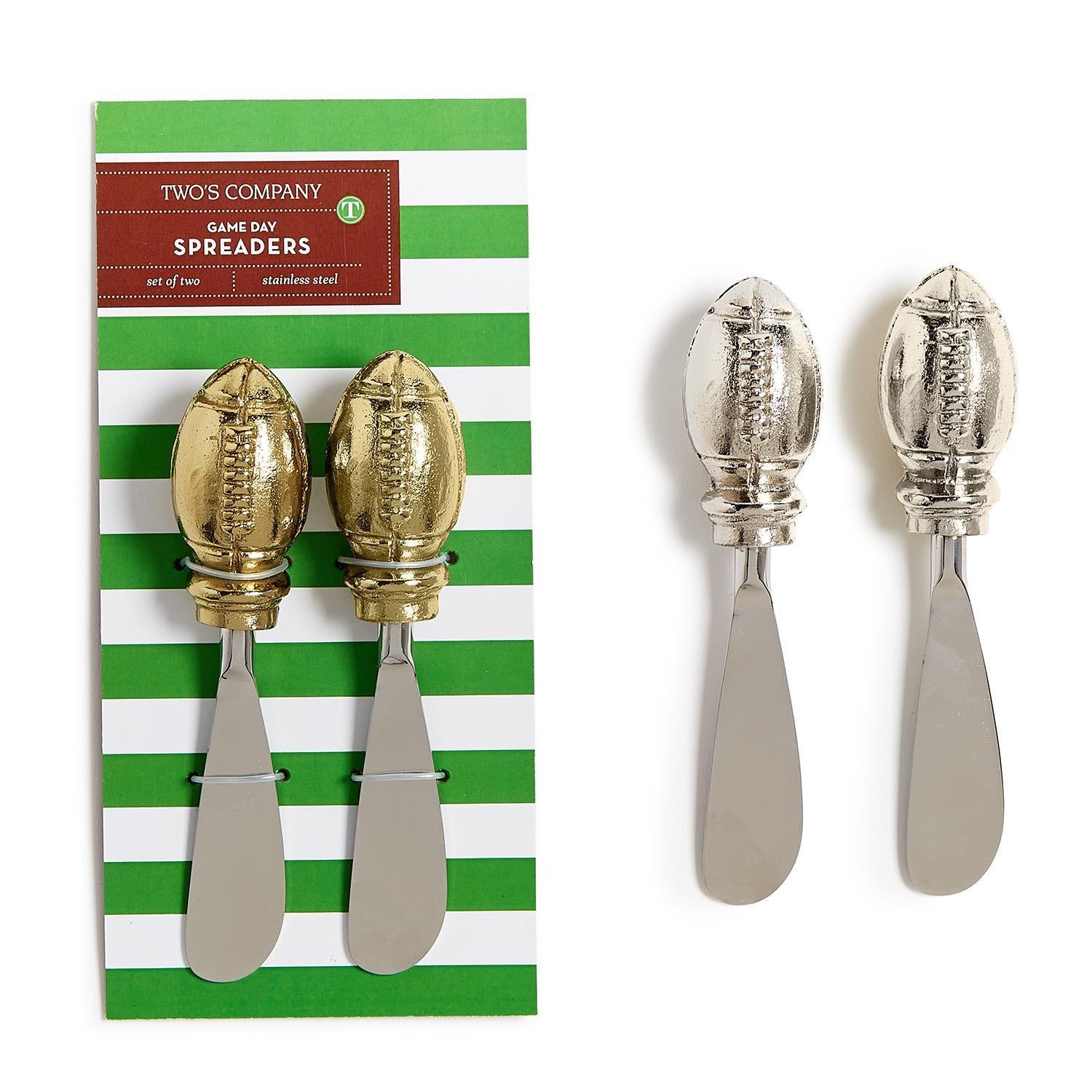 Set of 2 football spreaders with gold and silver football-shaped handles. Size not specified. Ideal for game day entertaining or gifting.