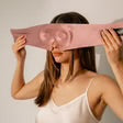 Large pink Drowsy Silk Sleep Mask, available in standard and king sizes.