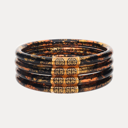 Set of 4 KOI Leopard AWB® bangles in Medium, leopard print, metallic gold accents, bold circular geometric center.