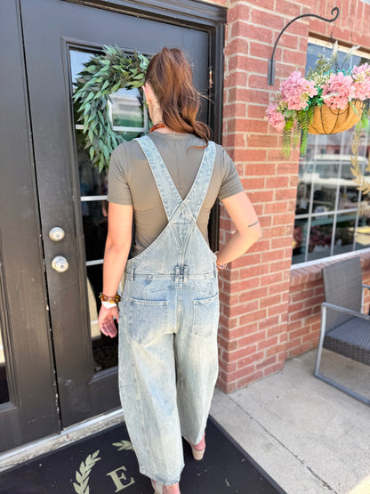 Dakota Mineral Wash Denim Jumpsuit in gray, available in sizes S-XL.
