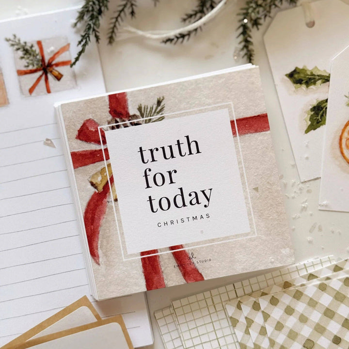 Square box of "Christmas gift truth for today cards" with red ribbon and greenery design on cover; sizes available: small, large.