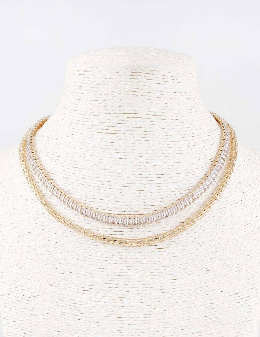 The Cali Gold Necklace: two gold chains, one with small rectangular diamonds. Available in 16", 18", and 20" lengths.