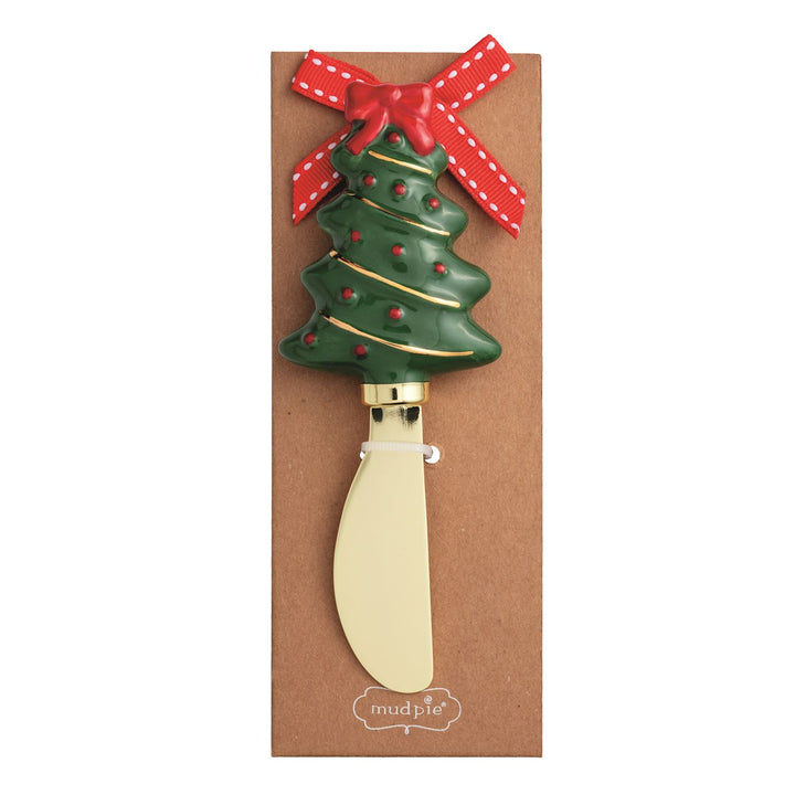 Christmas Whimsy Spreader featuring a green ceramic tree handle with gold trim, red dots, and a ribbon bow.