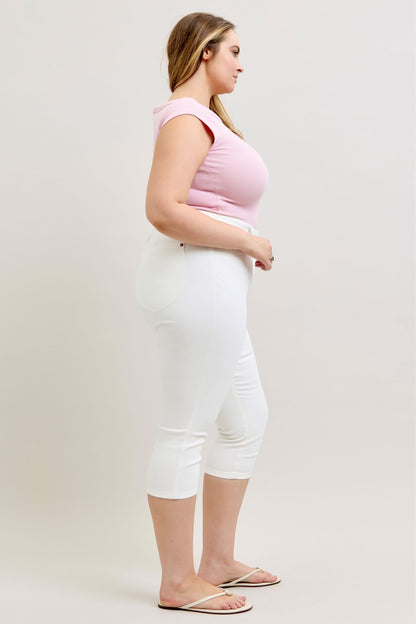 Judy Blue White Capri Jeans; high-waisted, cotton stretch fit. Available in sizes 0-20.