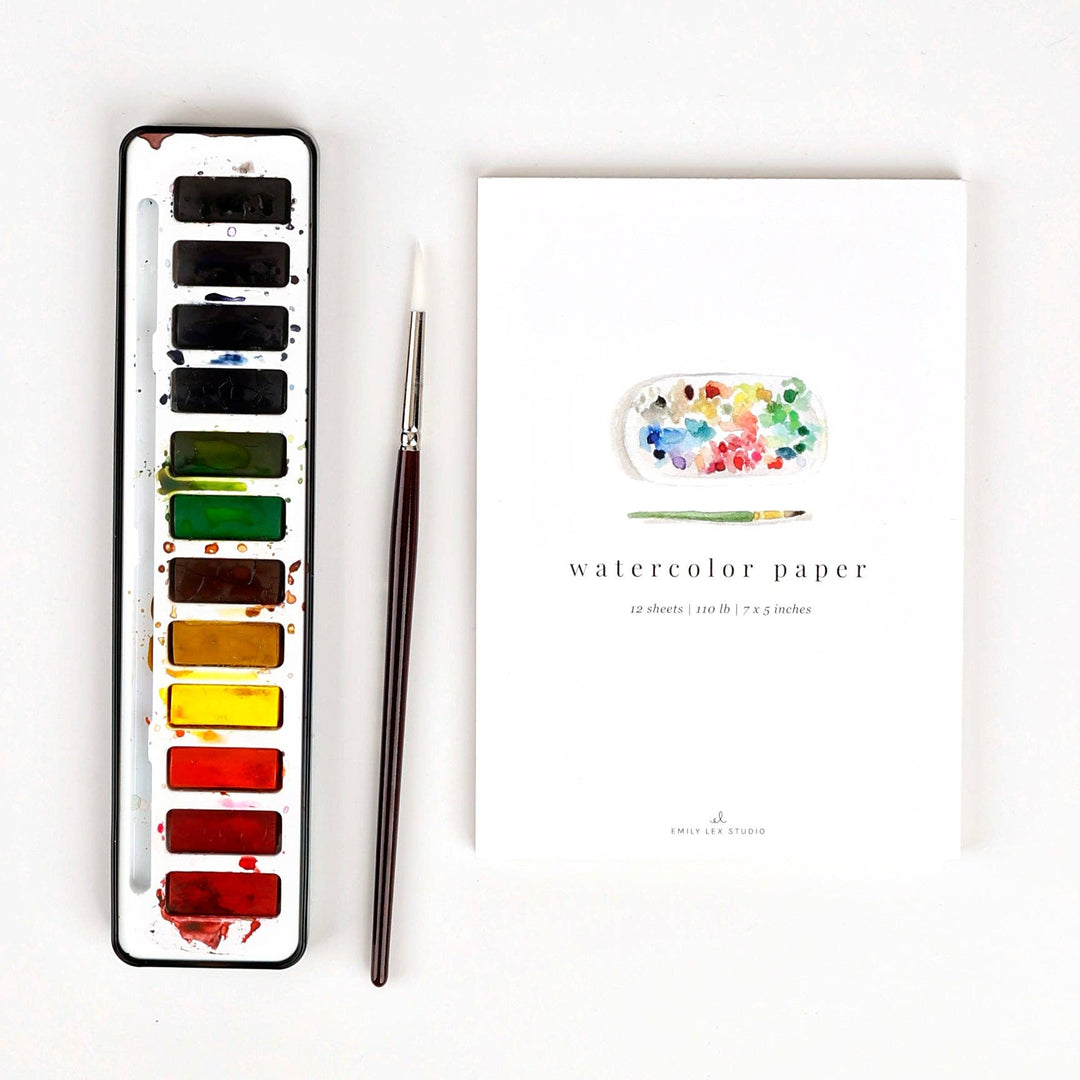 Set includes twelve watercolor paints, a paintbrush, and a 5x7 inch watercolor paper pad.
