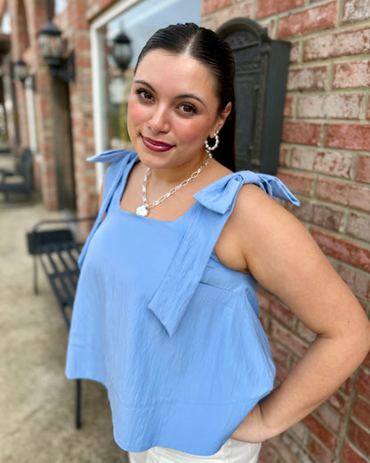 Sky Scoop Neck Bow Shoulder Top, ideal for spring. Available in sizes XS–XL.