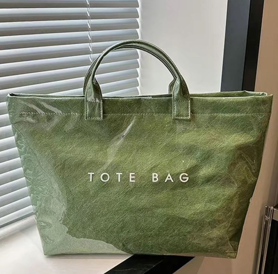 Green Vintage Tote Bag with short handles, "TOTE BAG" in white; available sizes: small, medium, large.