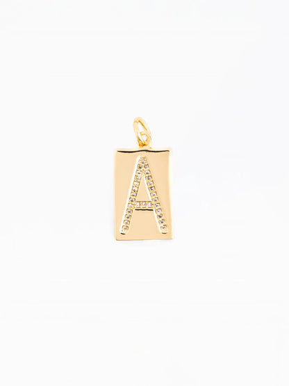 Gold rectangular pendant necklace with a crystal-studded capital “A” on 18k gold-plated, hypoallergenic chain; sizes available: 16″, 18″, and 20″.