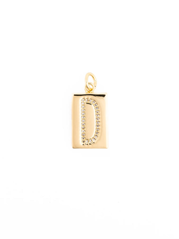 Customizable gold rectangular pendant necklace with the letter “D” in clear stones, 18k gold-plated, hypoallergenic, small loop for chain. Available in multiple sizes.
