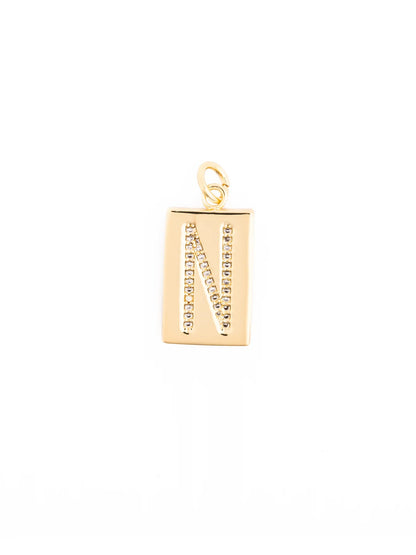 Thea Charm Bar: 18k gold plated rectangular pendant with the letter “N” outlined in clear stones and a top loop for attachment. Hypoallergenic. Available sizes: please check product listing for details.