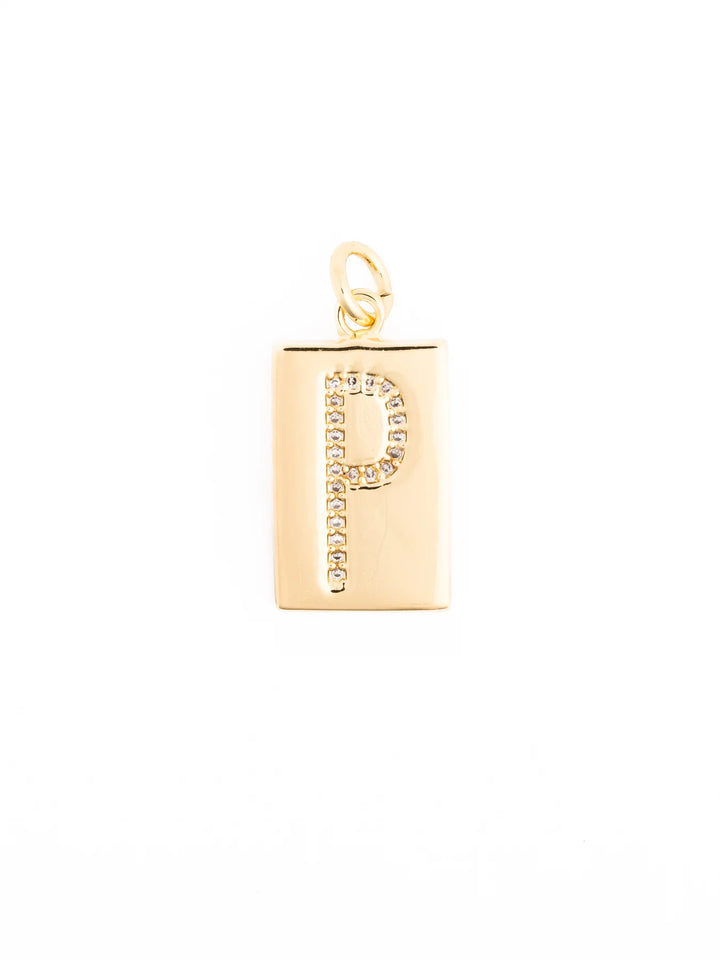 Rectangular 18k gold plated pendant with a loop, featuring the letter “P” in clear gemstones. Available in multiple sizes.