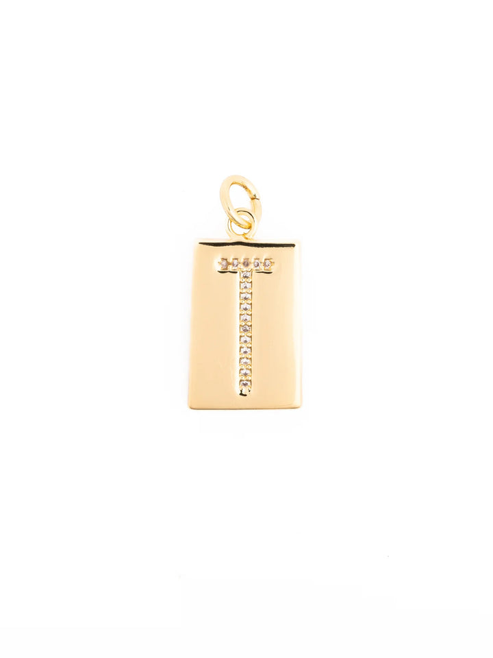 Thea Charm Bar is a hypoallergenic 18k gold-plated necklace featuring a rectangular pendant with a vertical row of clear stones and a round clasp. Available sizes: 16″, 18″, and 20″.