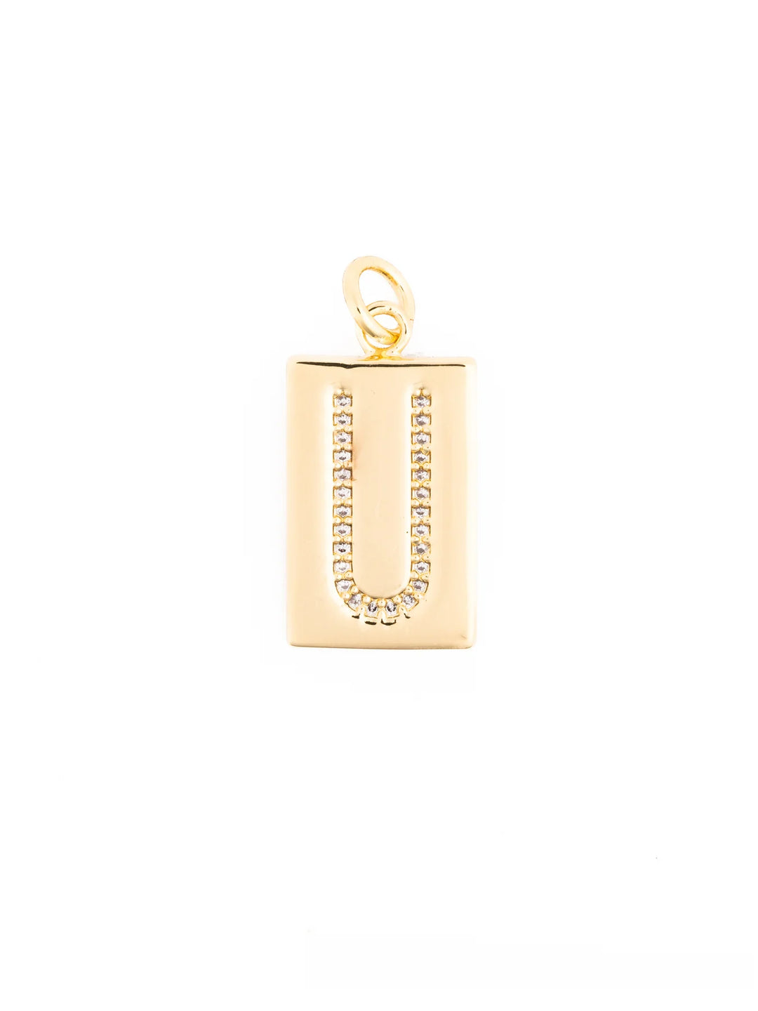 Thea Charm Bar: 18k gold plated rectangular pendant necklace with letter “U” outlined in clear stones and a top loop for attachment. Available in multiple sizes.