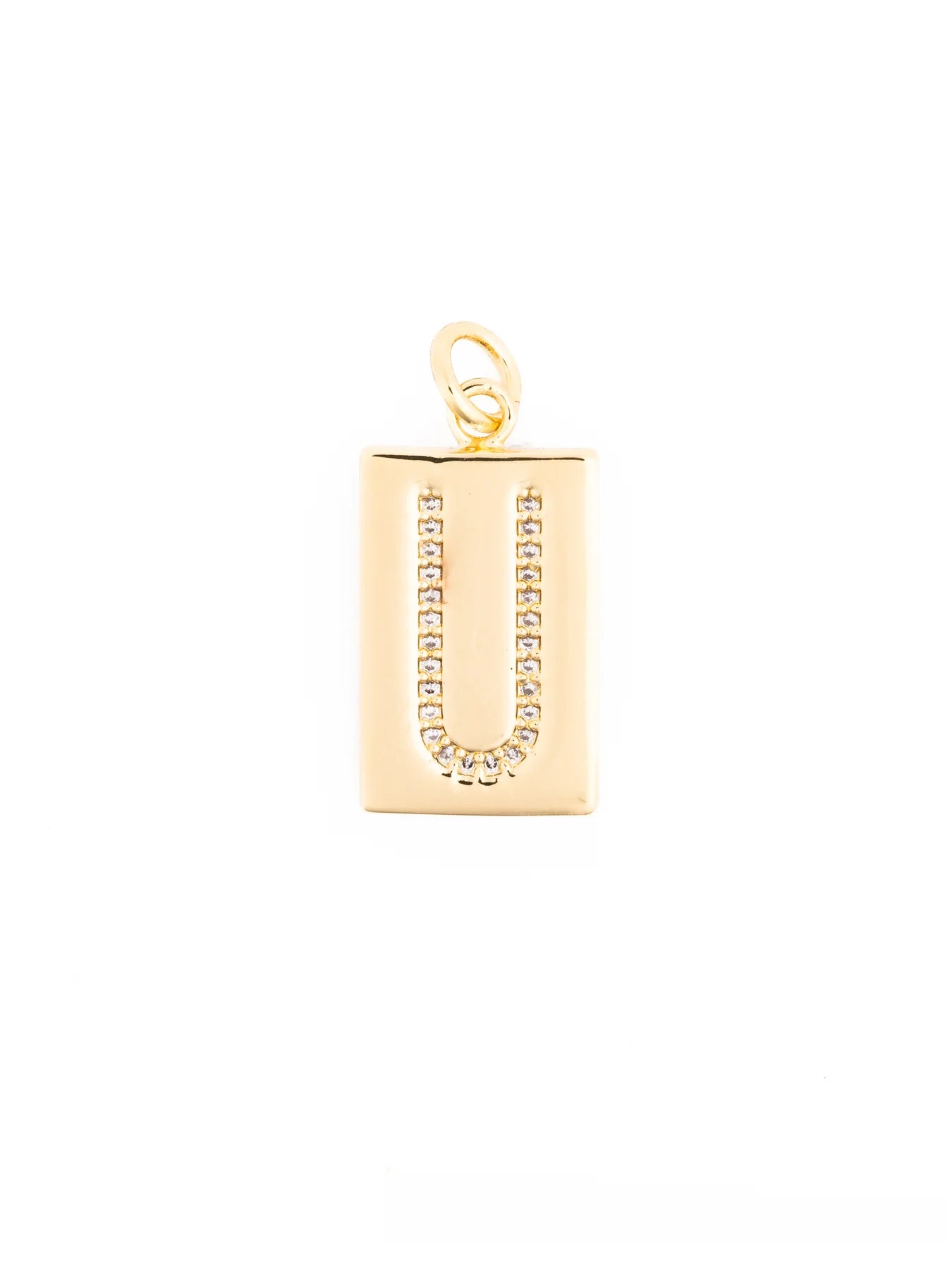 Thea Charm Bar: 18k gold plated rectangular pendant necklace with letter “U” outlined in clear stones and a top loop for attachment. Available in multiple sizes.