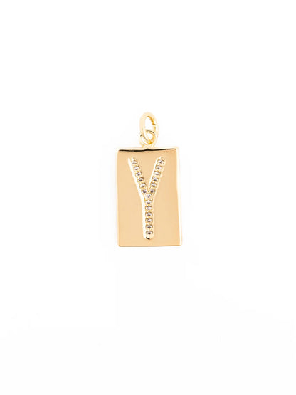 Rectangular gold pendant with a diamond-studded “Y” at the center and a small top loop; available in multiple sizes.