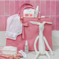 Sweet Grace Stain Remover bottle; brief, stain-fighting formula—available in 4oz and 16oz sizes.