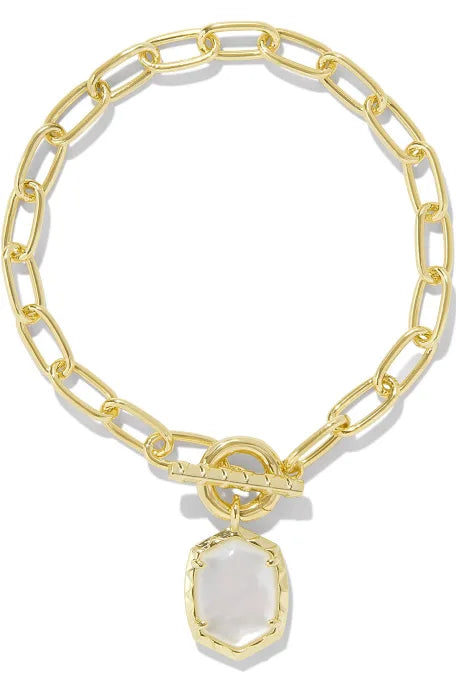 Large gold oval-link chain bracelet with toggle clasp and ivory mother of pearl charm in gold frame. Sizes: S, M, L.
