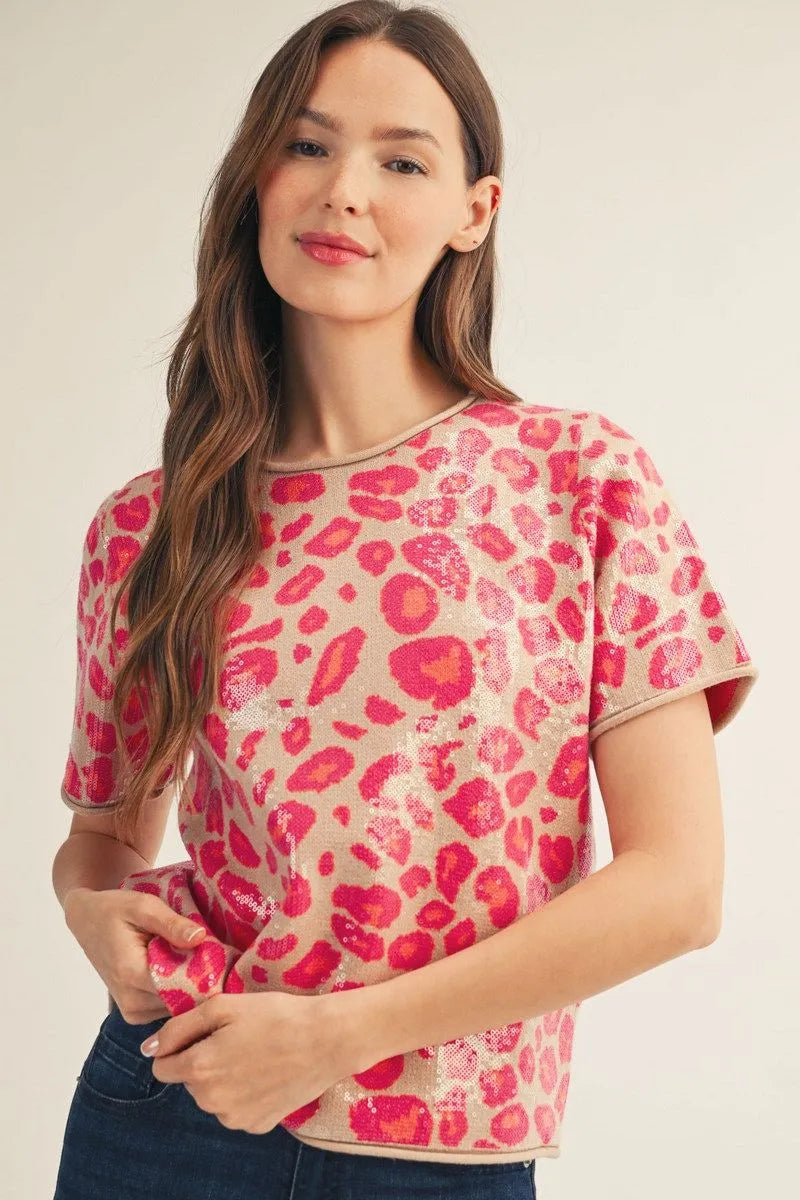 Pink Sequin Covered Leopard Top, short-sleeved with pink sequins in a chic leopard print; available in sizes XS-XL.
