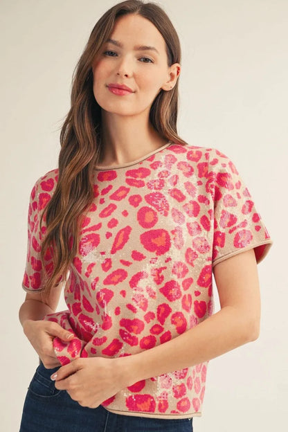 Pink Sequin Covered Leopard Top, short-sleeved with pink sequins in a chic leopard print; available in sizes XS-XL.