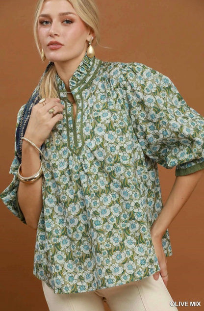 Floral Mandarin Collar Blouse in green and blue floral print cotton with puff sleeves, lightweight feel; available in sizes XS–XL.