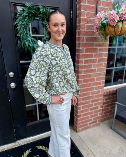 Naomi Painted Trillium Olive Top in sizes XS–XL.